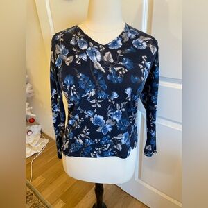 Shades of Blue Flowers Blend together on this 100% Merino Wool Sweater
